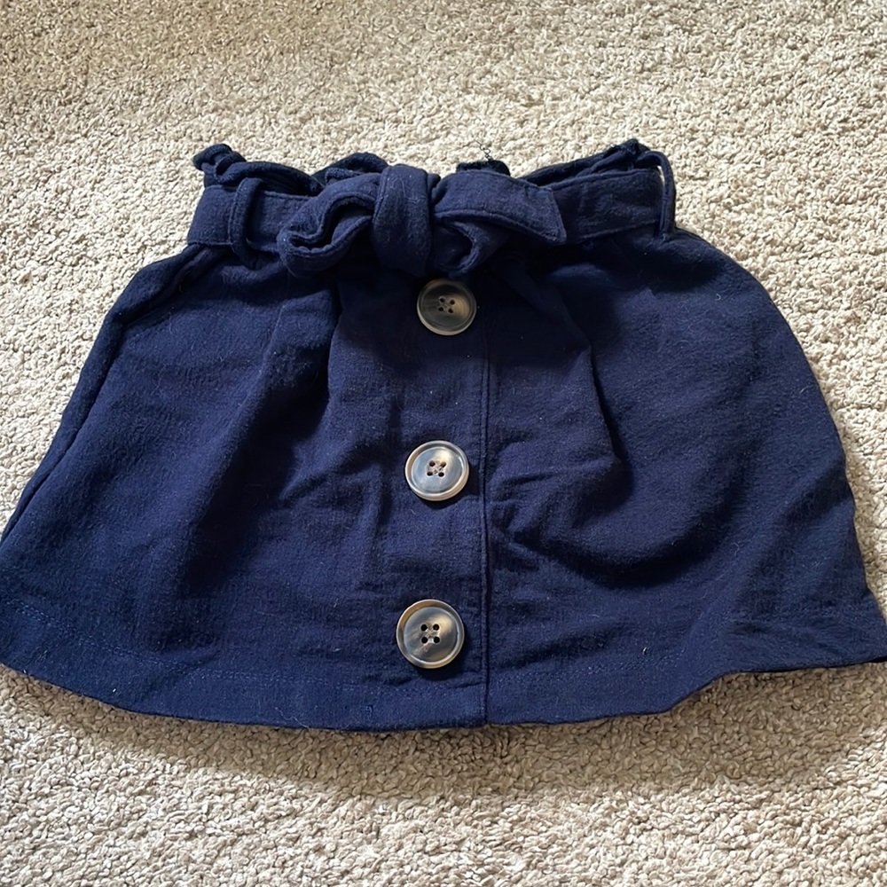 24 M Navy Button/Tie Skirt